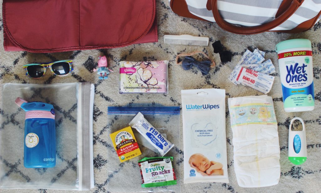 Everything you need to pack in a Toddler Diaper Bag. Toddler diaper bag essentials for a mom and her toddler.